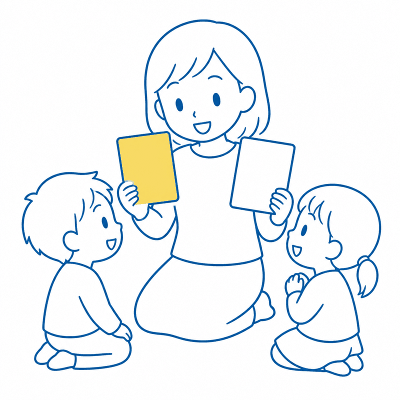 先生が子どもにカードを見せながら教えているイラスト